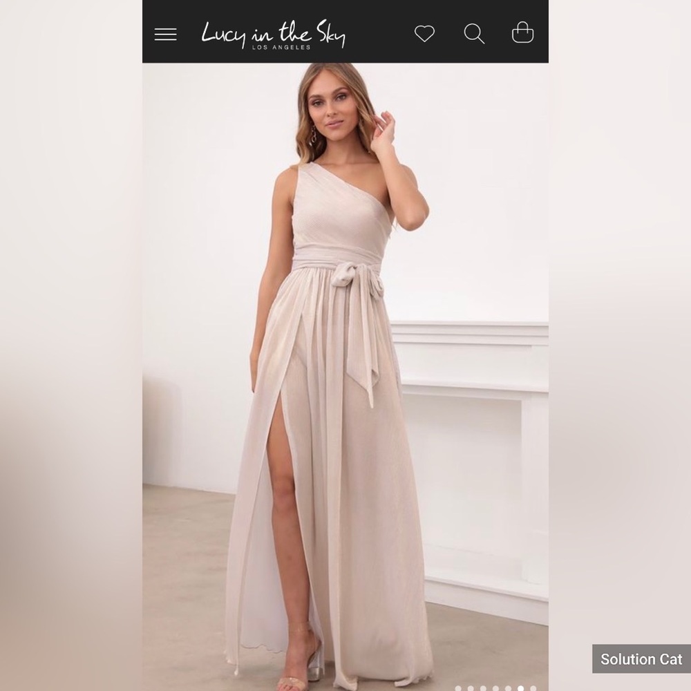 Trendy one shoulder maxi dress with ruched waistband and slit.